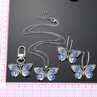 Retro Devil'S Eye Butterfly Alloy Women'S Earrings Keychain Necklace