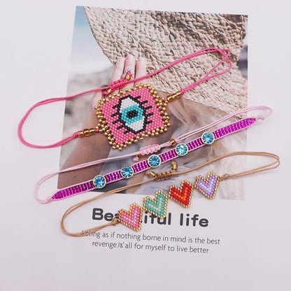 Retro Devil'S Eye Heart Shape Glass Rope Handmade Women'S Bracelets