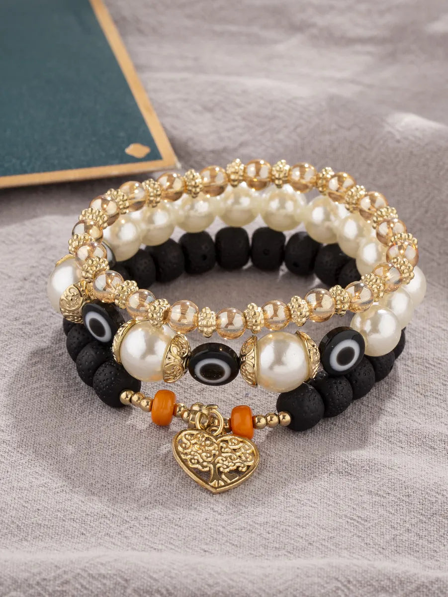 Retro Devil's Eye Tree Heart Shape Arylic Imitation Pearl Alloy Wholesale Bracelets