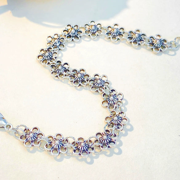 Retro Distressed Flower Alloy Bracelet With Hollow Design And Electroplating For Women