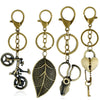 Retro Electroplated Alloy Peach Heart Bicycle Hat Keychain Pendant For Couple Bags And Car Keys