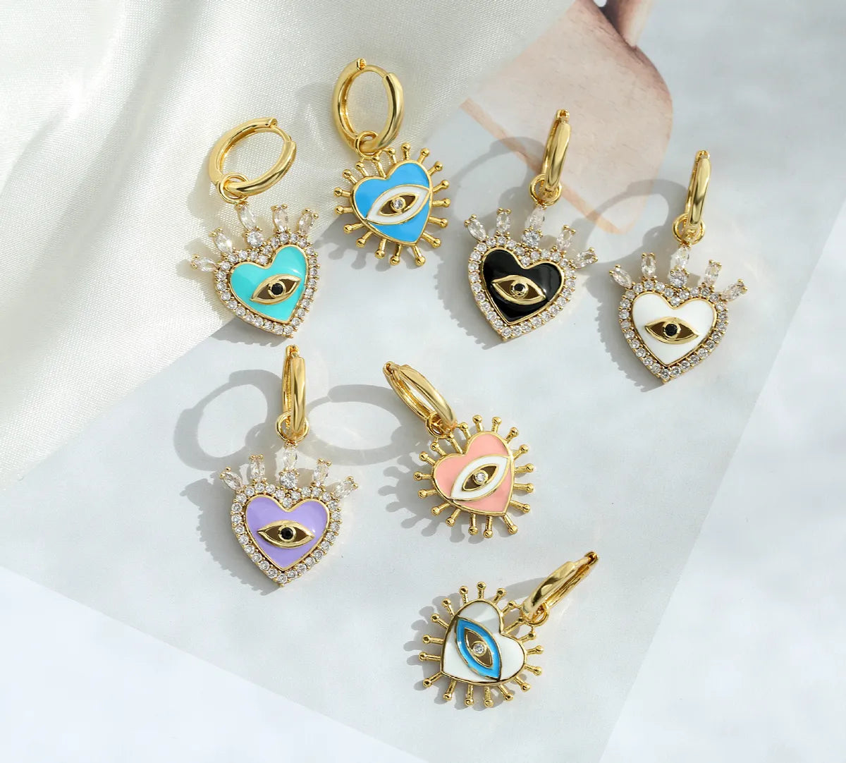 Retro Micro-inlaid Eyes Heart Shape Copper Plated Ear Clip Wholesale Gooddiy