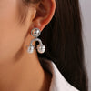 Retro Palace Style Geometric Upside Down U Shaped Imitation Pearl Titanium Steel Earrings With Electroplating