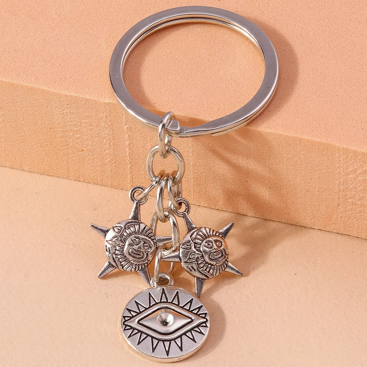 Retro Sun Eye Alloy Bag Pendant Keychain