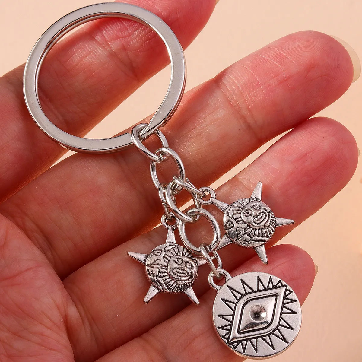 Retro Sun Eye Alloy Bag Pendant Keychain