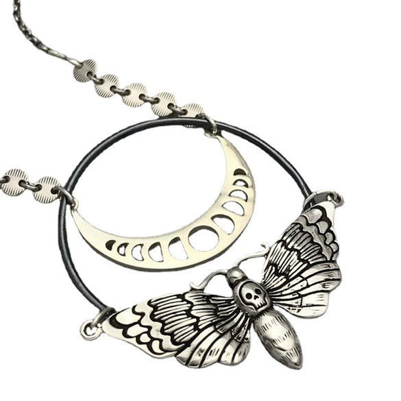 Retro Twining Moonstone Necklace With Dyed Black Feather And Inlaid Turquoise Pendant Moon Skull Moth Design Alloy Material Electroplating Treatment