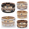 Retro Vacation Leaf Eye Feather Pu Leather Imitation Pearl Alloy Layered Women'S Bracelets