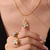 Rotating Super Flash Zircon Fourpetal Flower Jewelry Set In Titanium Steel With Electroplating For Women