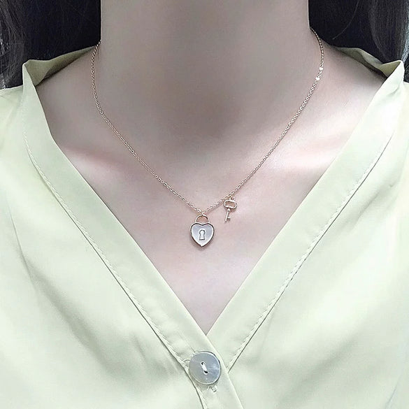 S925 Sterling Silver Heart Lock Necklace With Mixed Gem Pendant Electroplated Cross Chain Clavicle Necklace For Women Simple Light Luxury Style
