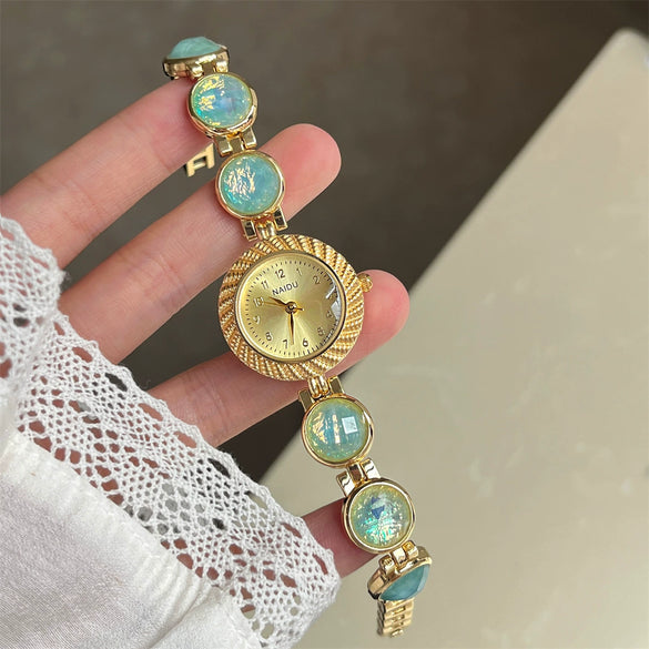 Secondhand Luxury Highend Colorful Women's Metal Bracelet Quartz Watch With Cat's Eye Chain And Round Dial