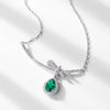 Silver Bow Inlaid Cultured Emerald Clavicle Necklace With Diamond Design