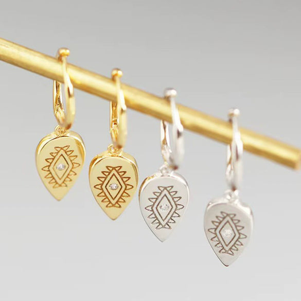 925 Silver Drop Earrings With Devil's Eye Shape And Ancient Egyptian Texture Set With Diamonds