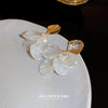 Silver Needle Earrings With Diamond Inlaid Imitation Pearl Petals And Tassel Geometric Shape High End And Versatile Design