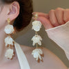 Silver Needle Earrings With Diamond Inlaid Imitation Pearl Petals And Tassel Geometric Shape High End And Versatile Design