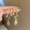 Silver Needle Pattern Oval Tassel Metal Earrings For Women With Electroplating Design