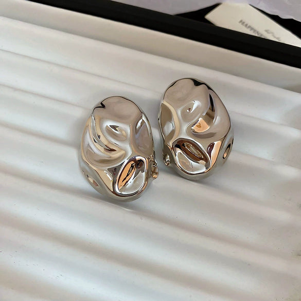 Silver Needle Pattern Oval Tassel Metal Earrings For Women With Electroplating Design