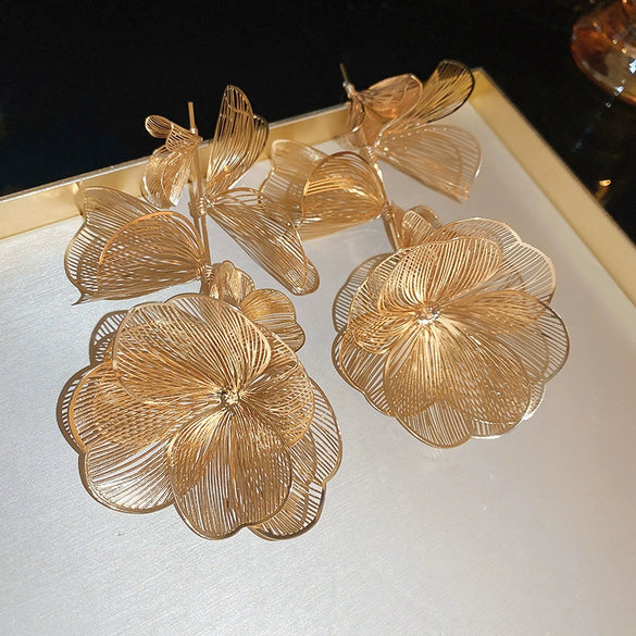 Silver Needle Pattern Oval Tassel Metal Earrings For Women With Electroplating Design