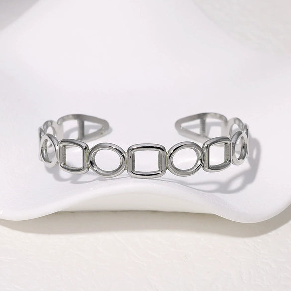 Simple Geometric Hollow Titanium Steel And Stainless Steel Female Bracelet With Electroplating Treatment