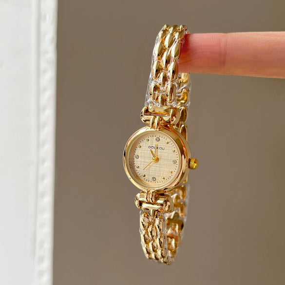 Simple Retro Women's Alloy Watches With Round Dial And Spiral Crown