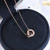 Simple Sterling Silver Geometric Double Ring Pendant Necklace With Electroplated Cross Chain