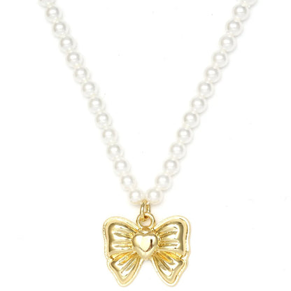 Simple Style Classic Style Bow Knot Imitation Pearl Copper Wholesale Pendant Necklace