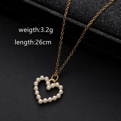 Simple Style Classic Style Heart Shape Zinc Alloy Inlay Pearl Women'S Pendant Necklace