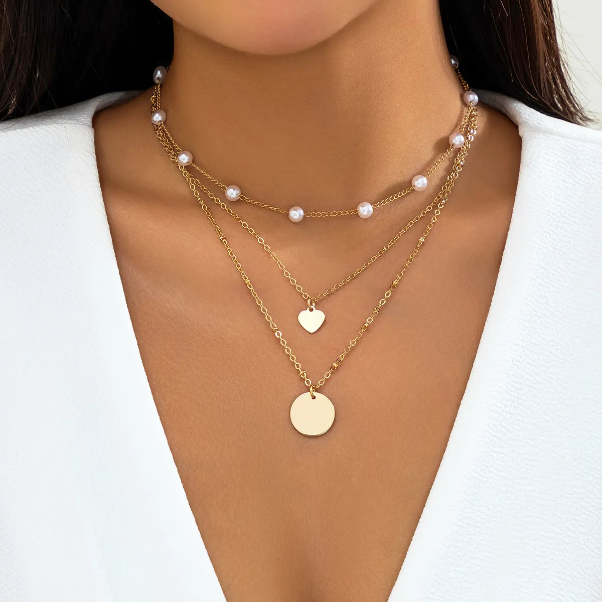 Simple Style Classic Style Irregular Round Imitation Pearl Copper Layered Tassel Layered Necklaces