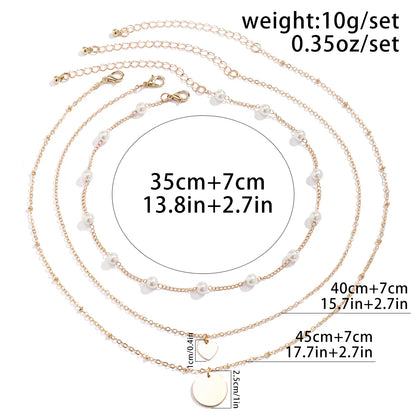 Simple Style Classic Style Irregular Round Imitation Pearl Copper Layered Tassel Layered Necklaces