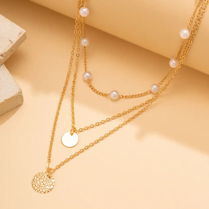 Simple Style Classic Style Irregular Round Tassel Copper Chain Imitation Pearl Copper Wholesale Layered Necklaces