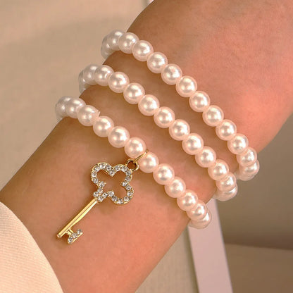 Simple Style Commute Heart Shape Artificial Pearl Alloy Beaded Inlay Zircon Women's Bracelets