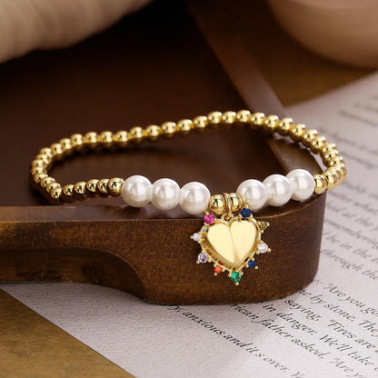 Simple Style Commute Heart Shape Copper Plating Inlay Artificial Pearls Zircon 18k Gold Plated Bracelets