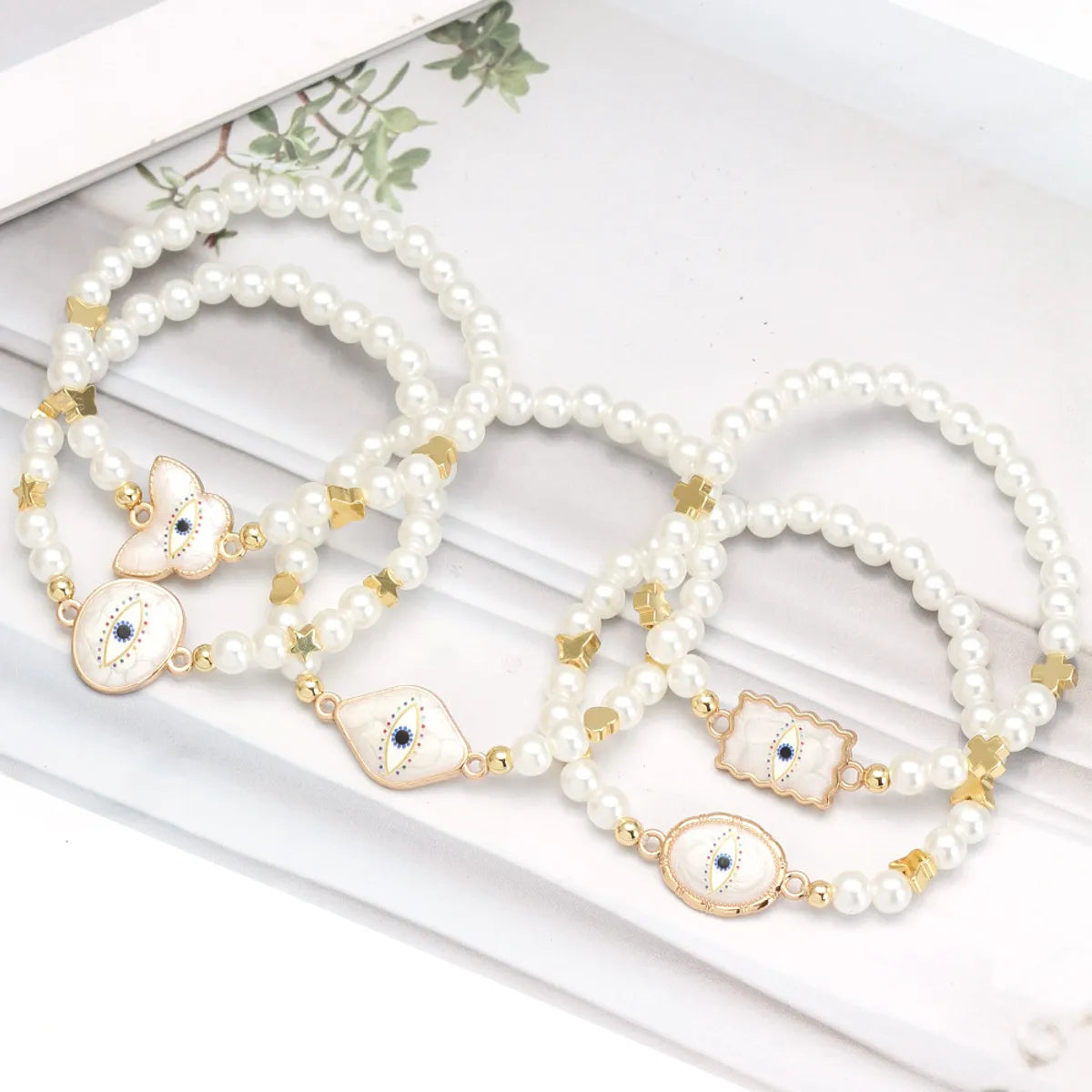 Simple Style Devil'S Eye Heart Shape Imitation Pearl Alloy Wholesale Bracelets