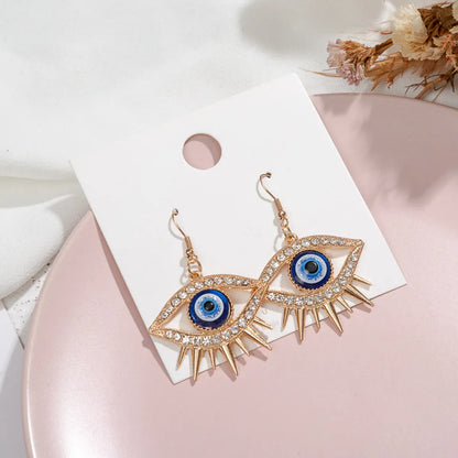 Simple Style Eye Alloy Inlay Rhinestones Women's Earrings