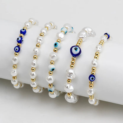 Simple Style Eye Artificial Pearl Copper Wholesale Bracelets