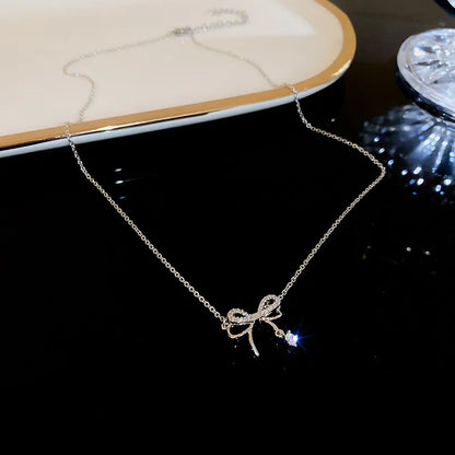 Simple Style Fruit Heart Shape Bow Knot Alloy Titanium Steel Plating Inlay Zircon Women'S Pendant Necklace