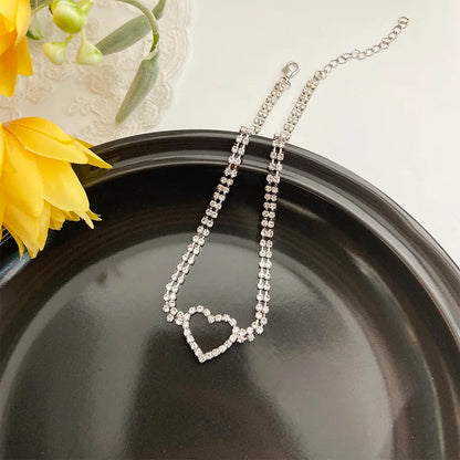 Simple Style Fruit Heart Shape Bow Knot Alloy Titanium Steel Plating Inlay Zircon Women'S Pendant Necklace