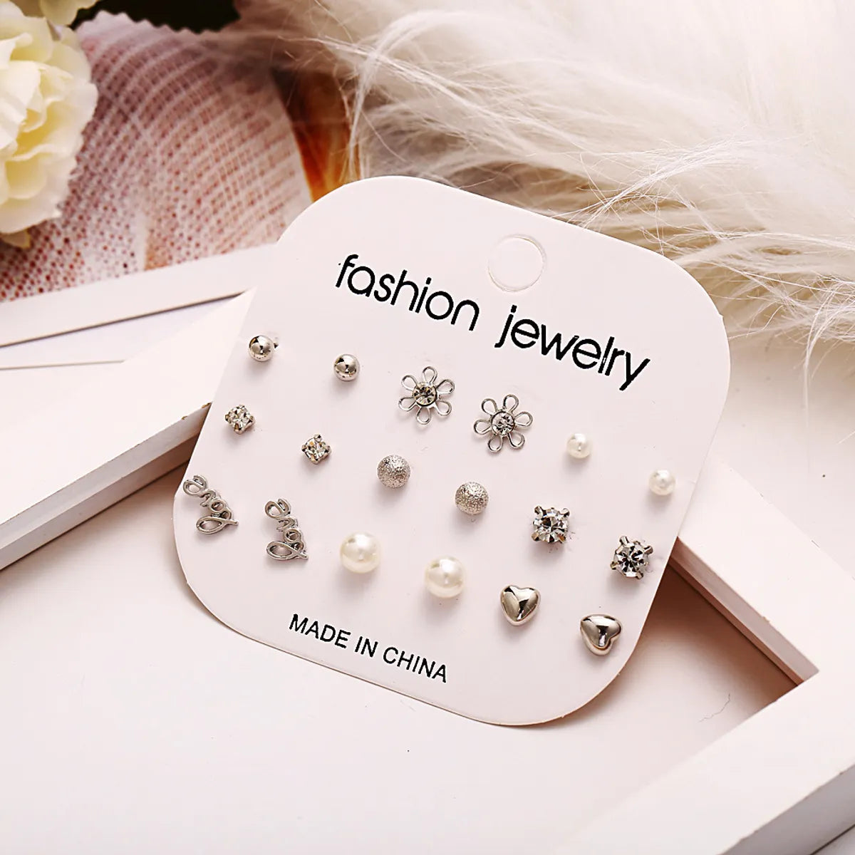 Simple Style Geometric Alloy Inlay Artificial Pearls Rhinestones Unisex Earrings 9 Pairs