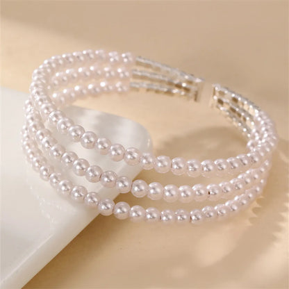 Simple Style Geometric Artificial Gemstones Artificial Pearl Zinc Alloy Layered Inlay Rhinestones Pearl Women'S Wristband