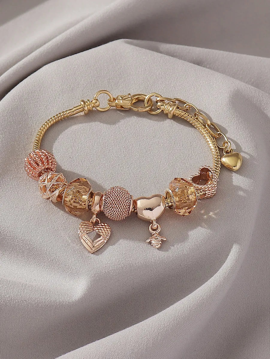 Simple Style Heart Shape Alloy Glass Copper Hollow Out Women'S Bracelets