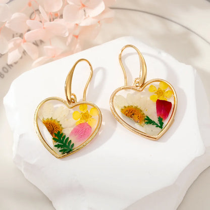 Simple Style Heart Shape Flower Alloy Epoxy Women'S Dangling Earrings 1 Pair