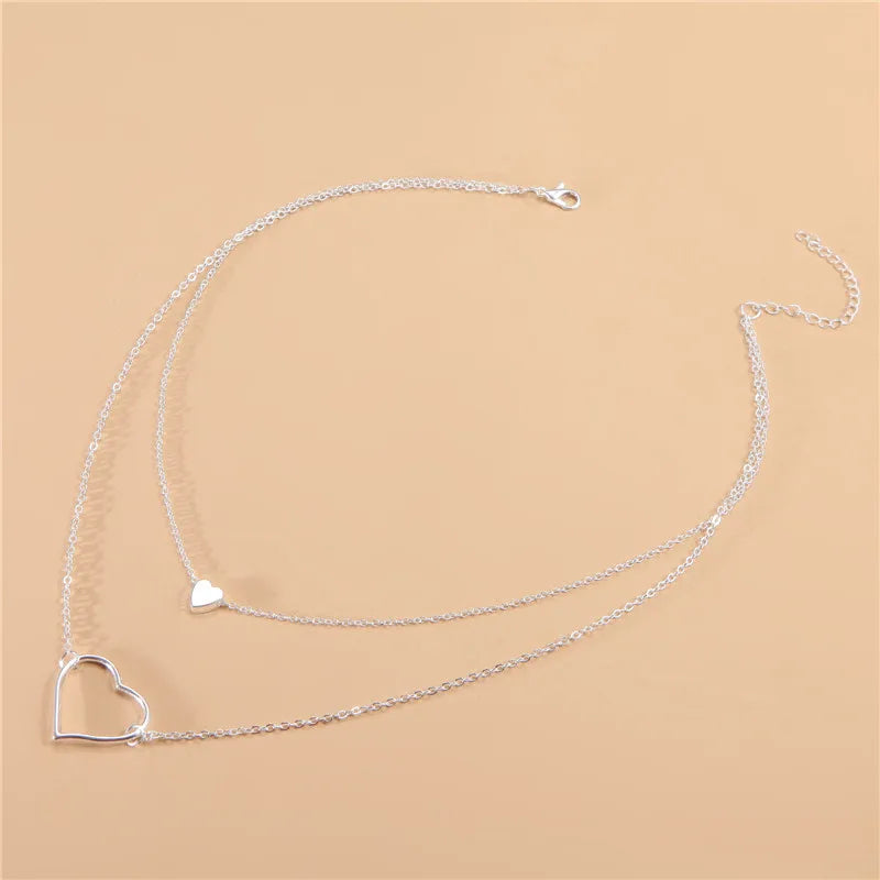 Wholesale Jewelry Simple Style Heart Shape Synthetics Acrylic Artificial Pearls Artificial Gemstones Inlay Hollow Out Pendant Necklace