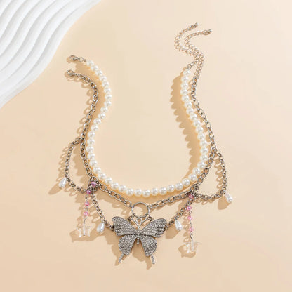 Simple Style Round Butterfly Imitation Pearl Alloy Iron Inlay Rhinestones Women's Pendant Necklace