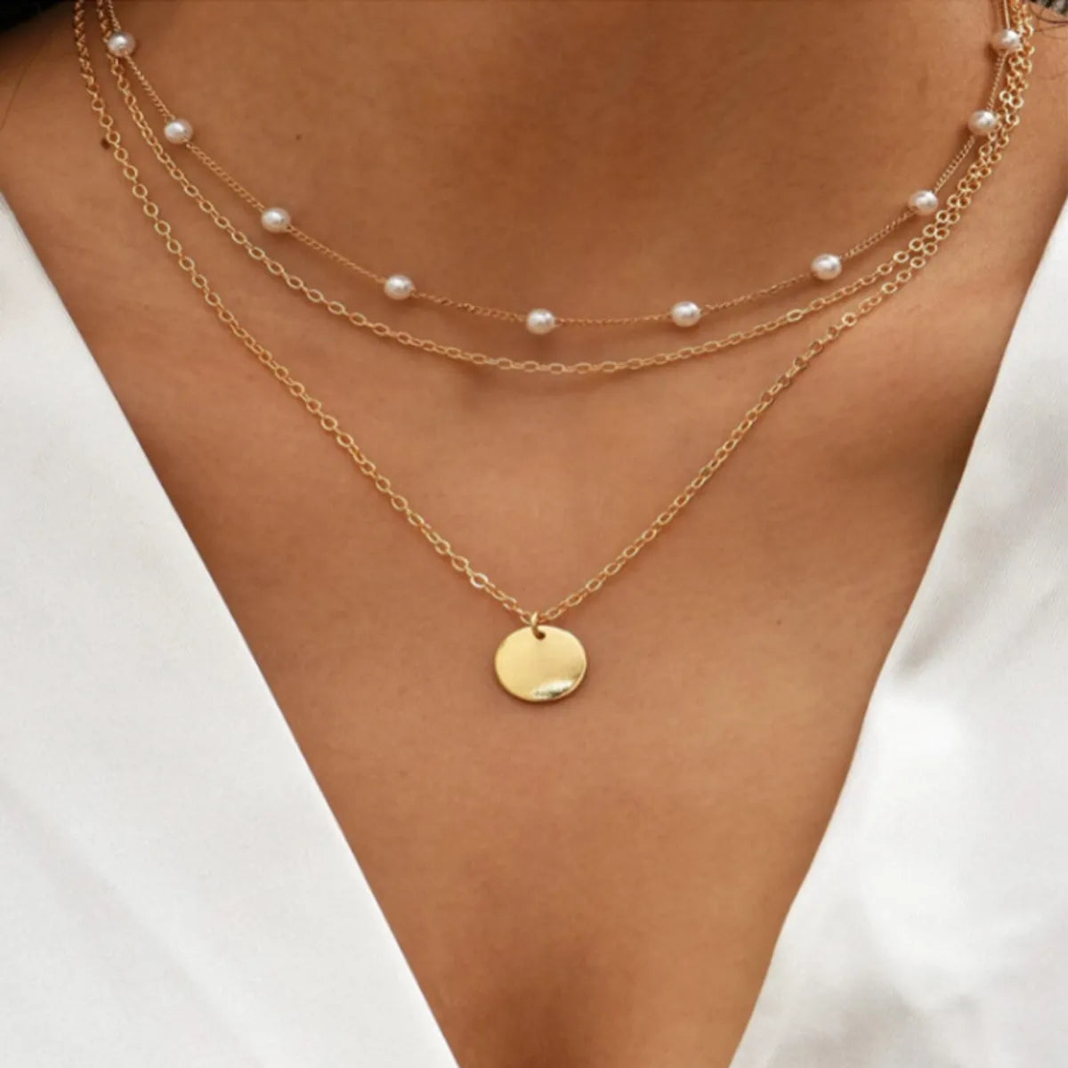 Simple Style Solid Color Alloy Wholesale Layered Necklaces