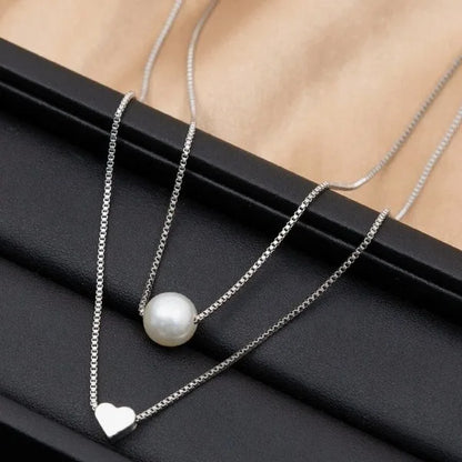 Simple Style Solid Color Alloy Wholesale Layered Necklaces