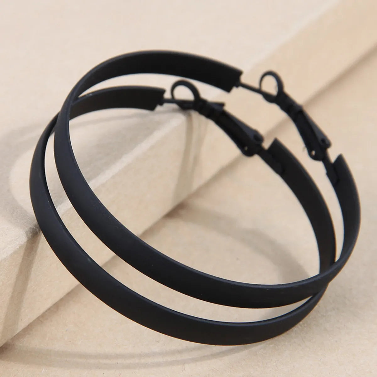 Simple Style Solid Color Ferroalloy Women's Hoop Earrings