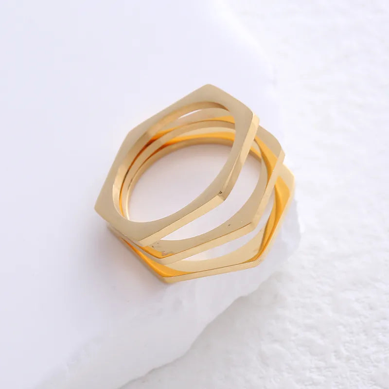 304 Stainless Steel 18K Gold Plated Simple Style Plating Hollow Out Solid Color No Inlaid Rings