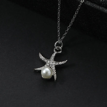 Simple Style Star Alloy Steel Asymmetrical Inlay Artificial Pearls Women's Pendant Necklace