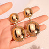 Solid Color Geometric Leaf Hoop Earrings With Smooth Metal Disc Design Exaggerated Versatile Unisex Statement Jewelry