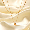 Stainless Steel And Titanium Steel Double Layer Necklace With Oval Bead Chain Twist Chain And Small Gold Ball Pendant Geometric Pattern Electroplating Design For Women