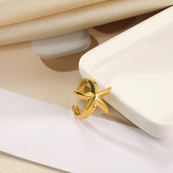 Stainless Steel Asymmetrical Geometric Ring With Flower Knot Texture And Electroplating